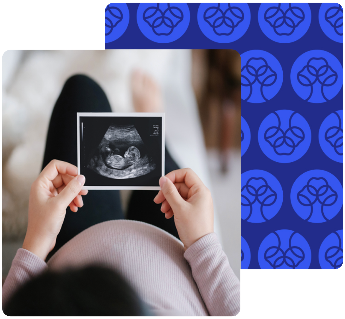 Woman holding an ultrasound image of her baby